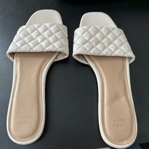A New Day white slide on sandals. Size 10